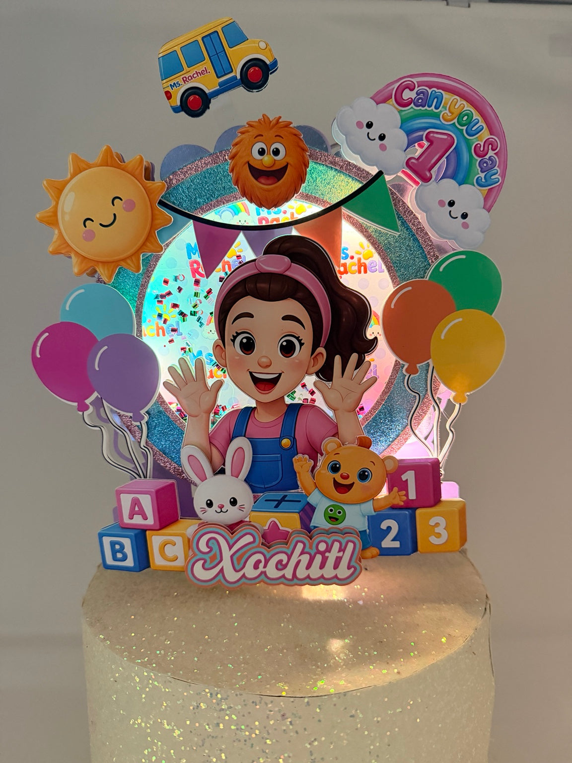 Cake topper with lights on