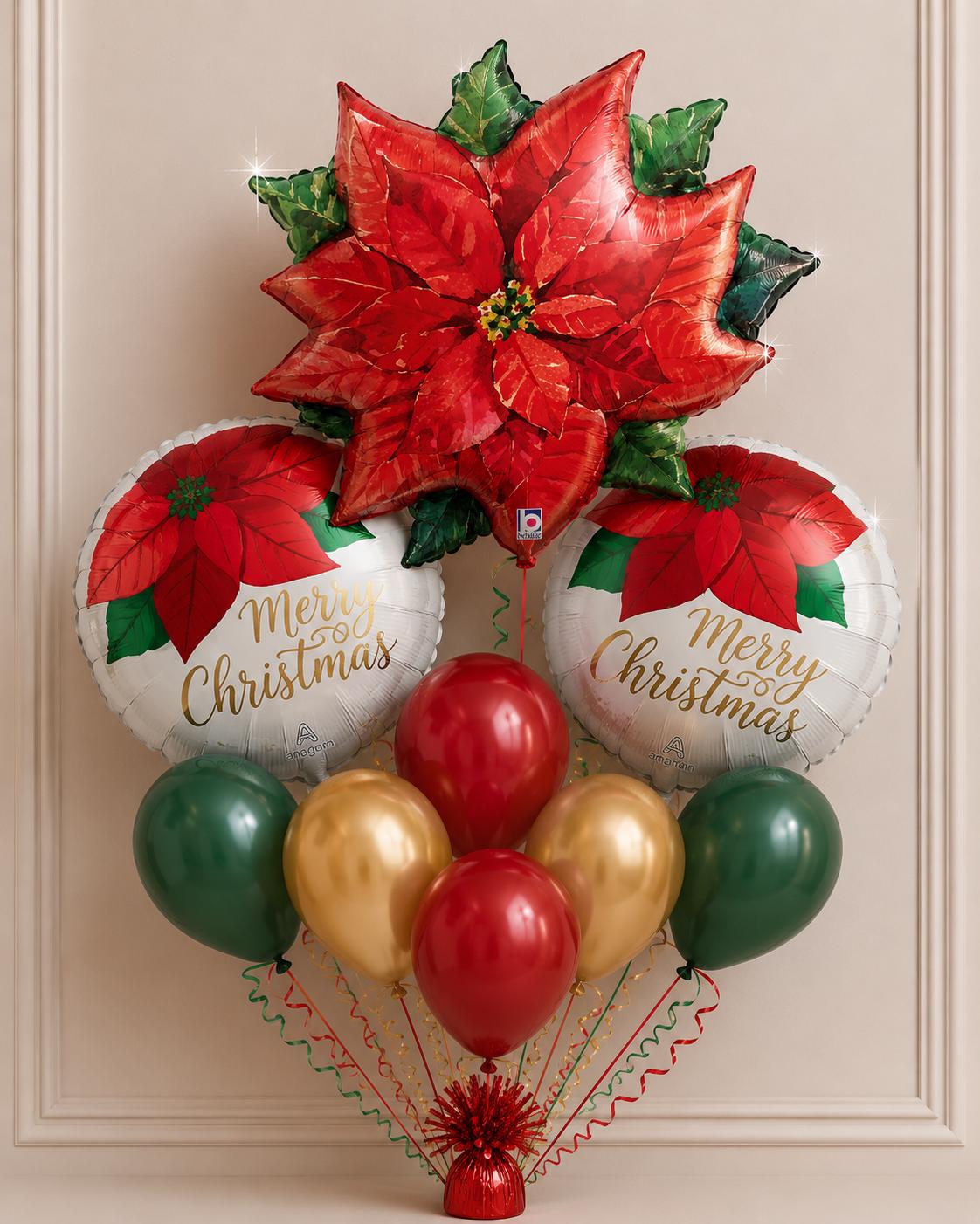 Red poinsettia Christmas balloon bouquet with green and gold details