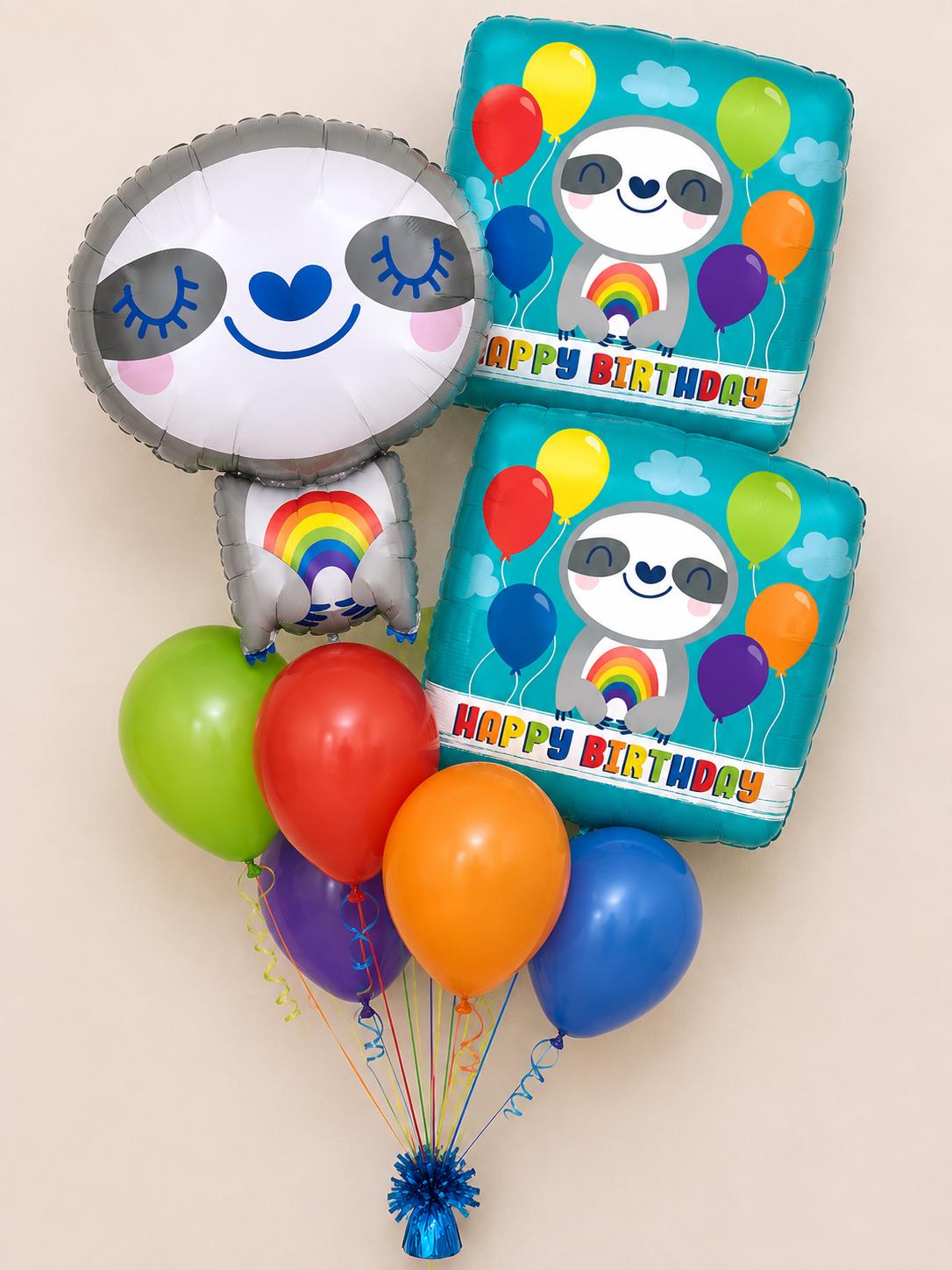 Sloth birthday balloon bouquet with rainbow colors and coordinating latex balloons