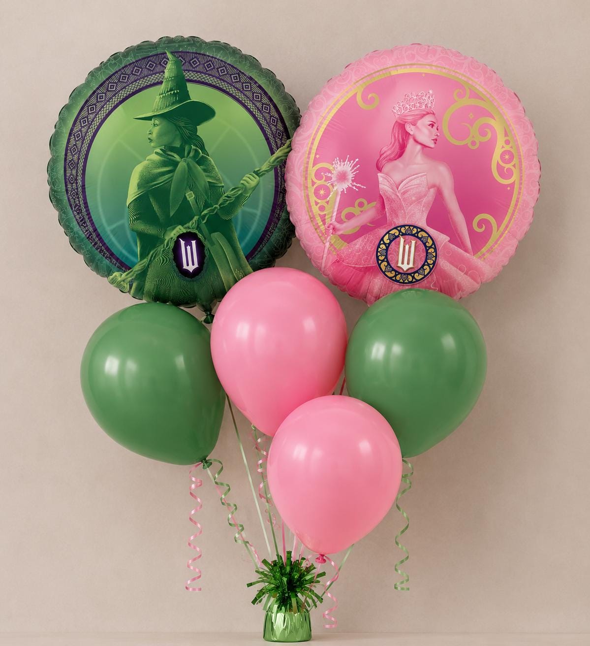 Wicked Glinda and Elphaba balloon bouquet with pink and green latex balloons