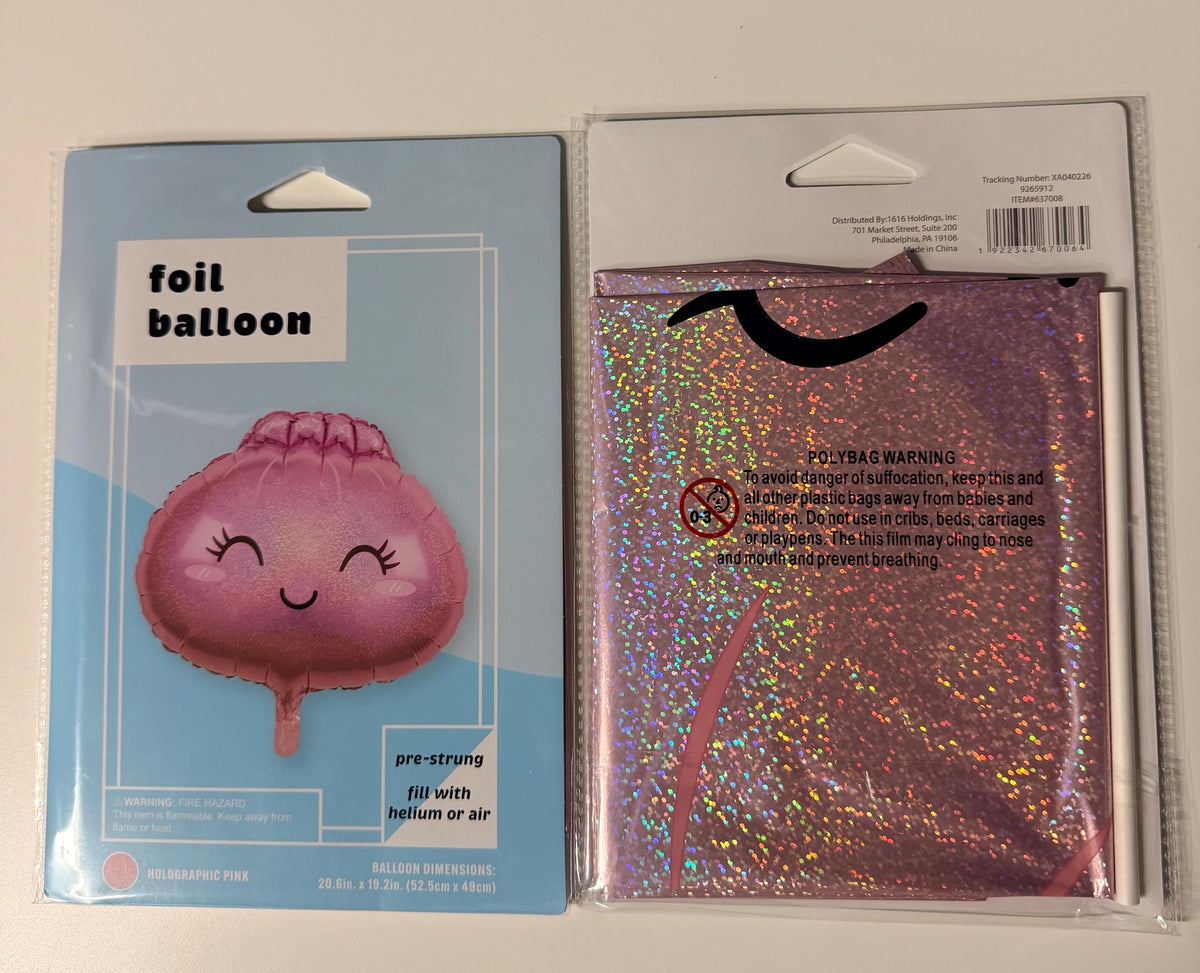 Holographic pink smiling dumpling foil balloon in retail packaging