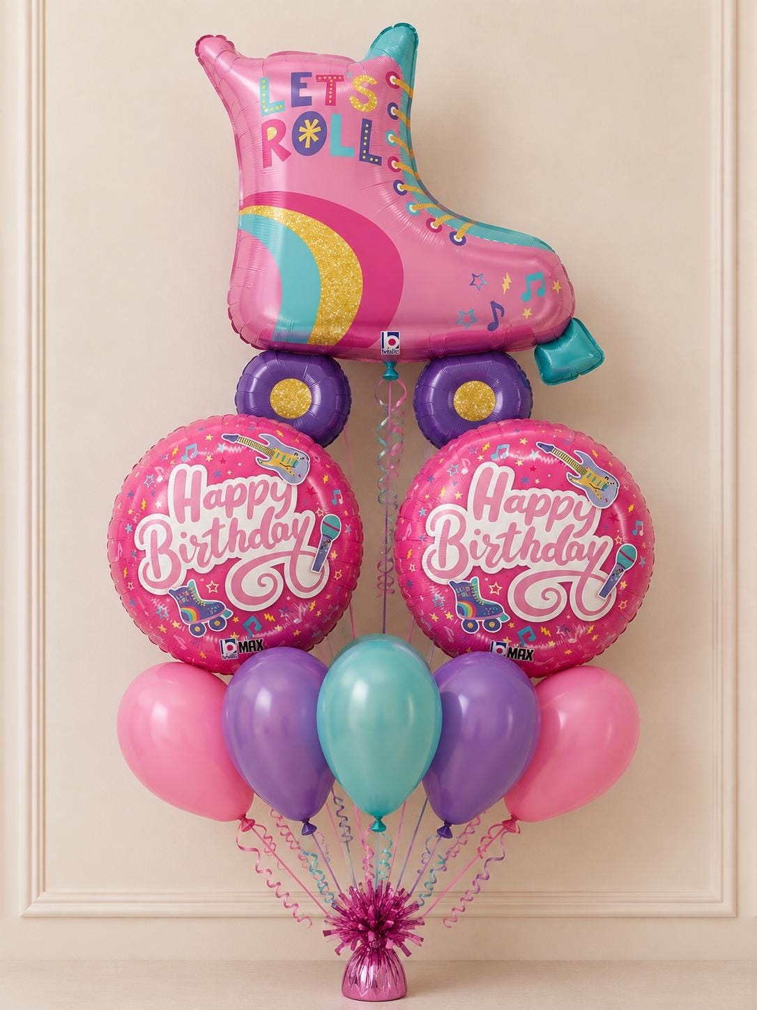 Pink roller skate birthday balloon bouquet with coordinating pastel latex balloons