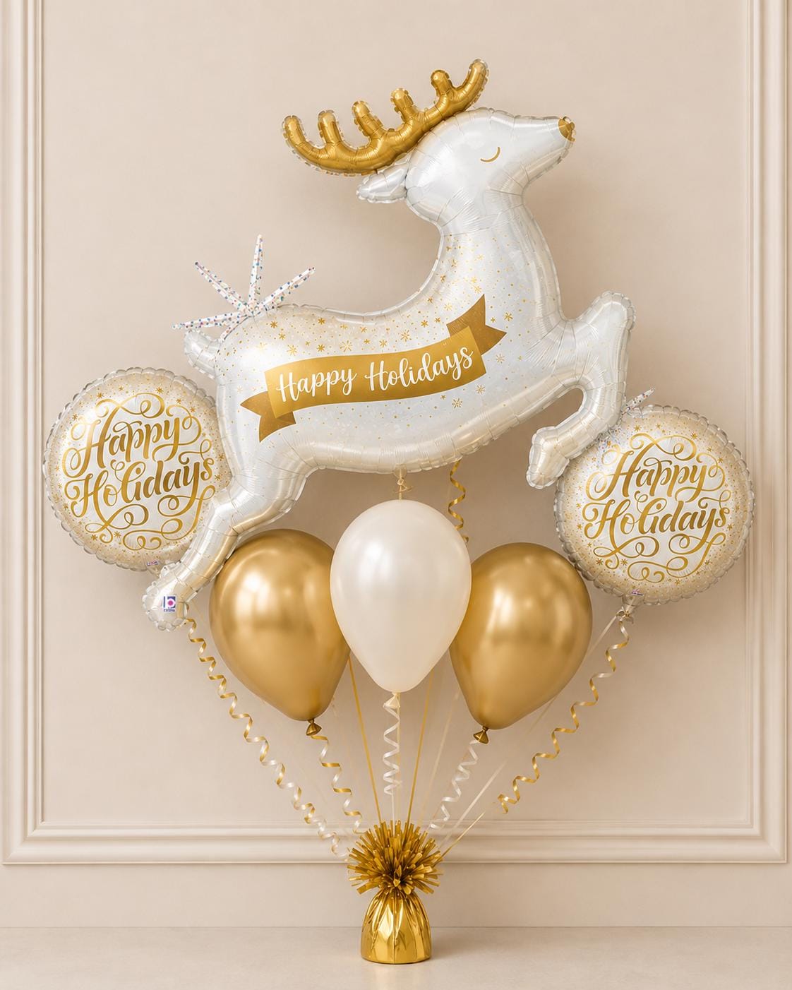 White and gold reindeer holiday balloon bouquet