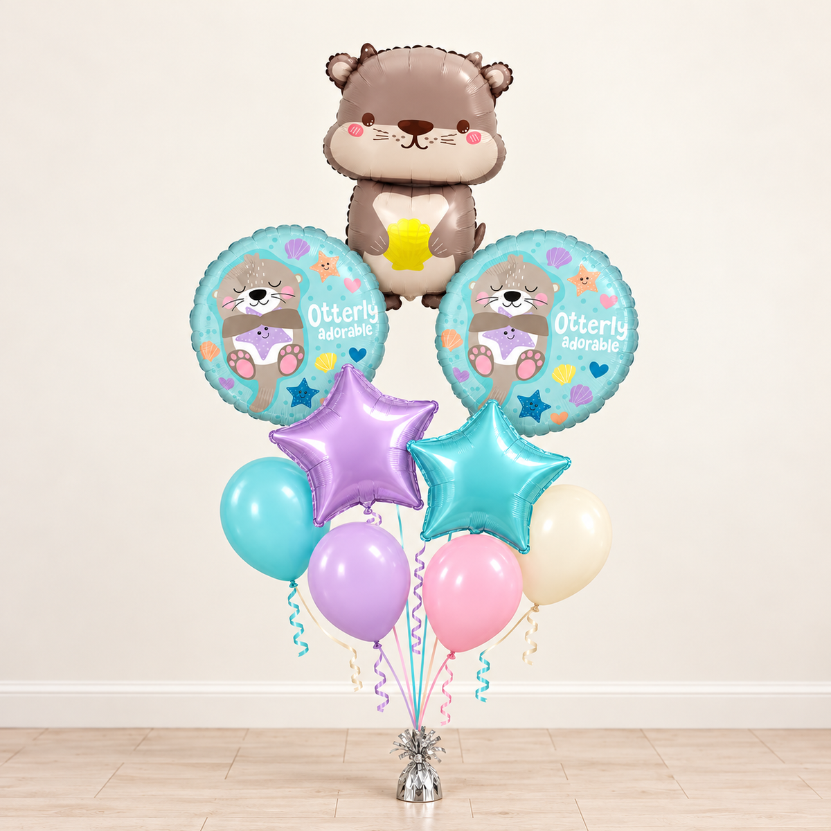 Otterly Adorable balloon bouquet with otter shaped balloon