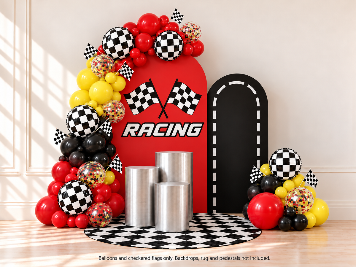 Red black yellow racing balloon garland styled by color; backdrop panels, rug and pedestals not included.